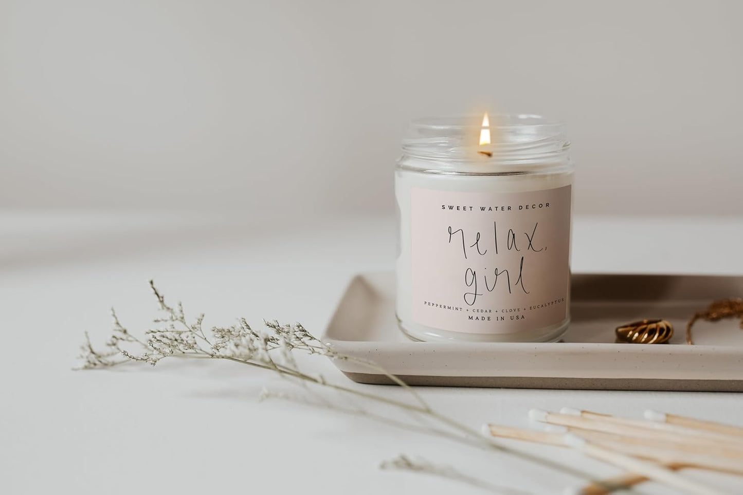 Sweet Water Decor Relax Girl Candle: A Soothing Retreat for Your Home