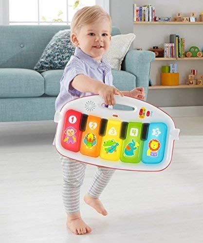 Fisher-Price Baby-Spielmatte „Glow and Grow Kick & Play Piano Gym“, blaues musikalisches Lernspielzeug mit Entwicklungsaktivitäten für Neugeborene ab 0 Monaten