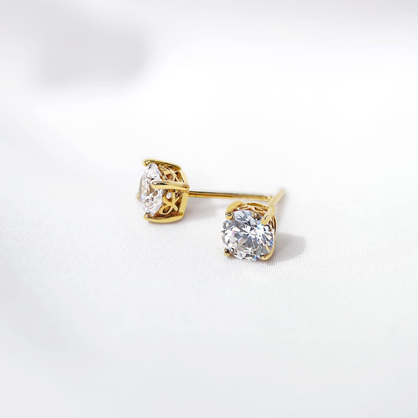 Amazon Essentials Yellow Gold Plated, Platinum or Rose Gold Plated Sterling Silver Infinite Elements Cubic Zirconia Stud Earrings | White, Blue, Green, or Pink Cubic Zirconia
