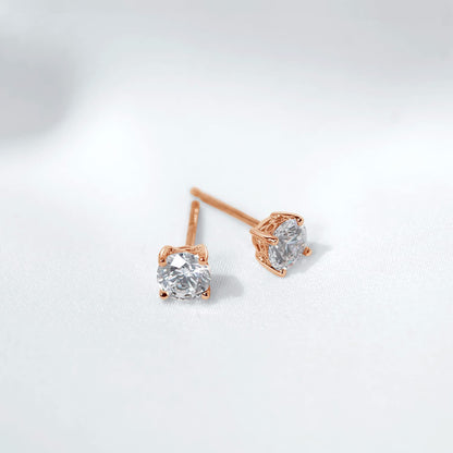 Amazon Essentials Yellow Gold Plated, Platinum or Rose Gold Plated Sterling Silver Infinite Elements Cubic Zirconia Stud Earrings | White, Blue, Green, or Pink Cubic Zirconia