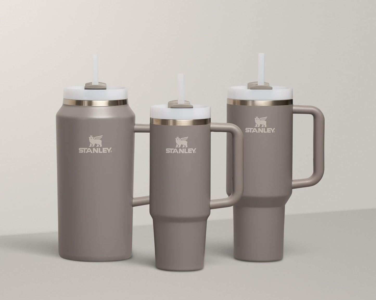 Vaso Stanley Quencher H2.0 con asa y pajita de 40 oz | Tapa Flowstate de 3 posiciones | Compatible con portavasos para viajes | Vaso térmico de acero inoxidable | Sin BPA | Arándano