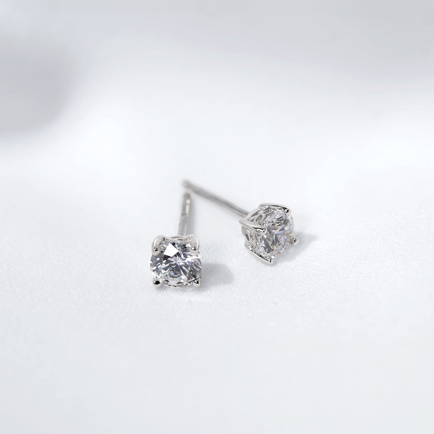 Amazon Essentials Yellow Gold Plated, Platinum or Rose Gold Plated Sterling Silver Infinite Elements Cubic Zirconia Stud Earrings | White, Blue, Green, or Pink Cubic Zirconia