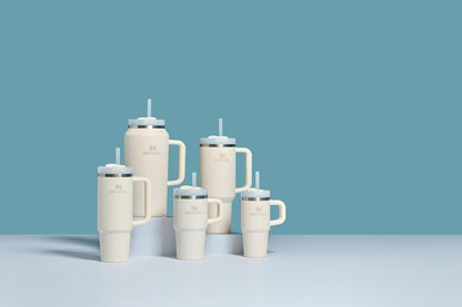 Vaso Stanley Quencher H2.0 con asa y pajita de 40 oz | Tapa Flowstate de 3 posiciones | Compatible con portavasos para viajes | Vaso térmico de acero inoxidable | Sin BPA | Arándano