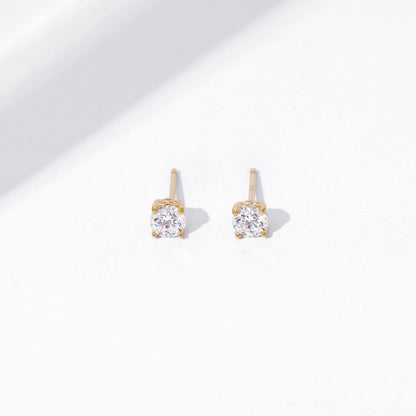 Amazon Essentials Yellow Gold Plated, Platinum or Rose Gold Plated Sterling Silver Infinite Elements Cubic Zirconia Stud Earrings | White, Blue, Green, or Pink Cubic Zirconia