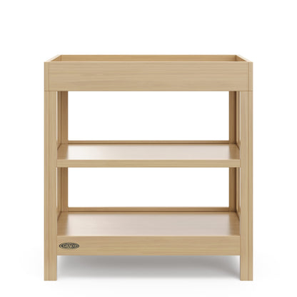 Graco Teddi Changing Table with Water-Resistant Changing Pad (Driftwood) - GREENGUARD Gold Certified, Includes Bonus Water-Resistant Changing Pad with Safety Strap, 2 Shelves, Easy-to-Match
