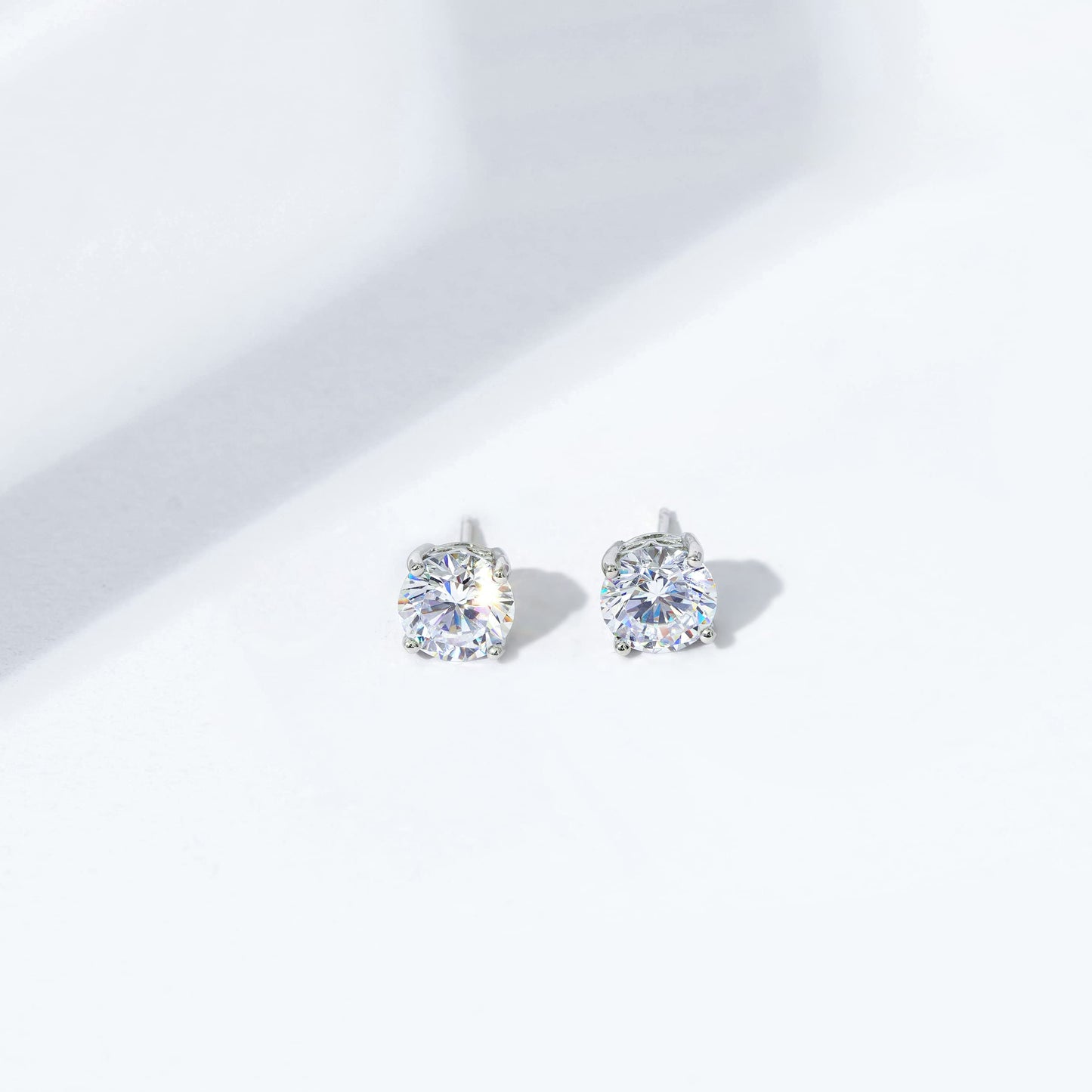 Amazon Essentials Yellow Gold Plated, Platinum or Rose Gold Plated Sterling Silver Infinite Elements Cubic Zirconia Stud Earrings | White, Blue, Green, or Pink Cubic Zirconia