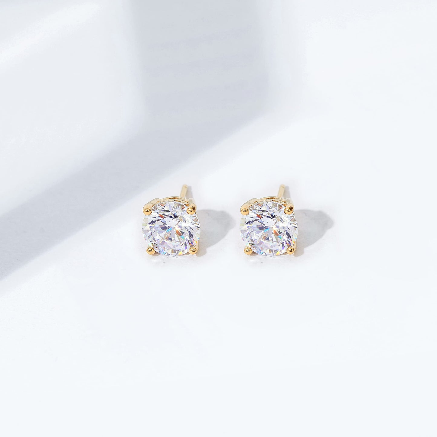 Amazon Essentials Yellow Gold Plated, Platinum or Rose Gold Plated Sterling Silver Infinite Elements Cubic Zirconia Stud Earrings | White, Blue, Green, or Pink Cubic Zirconia