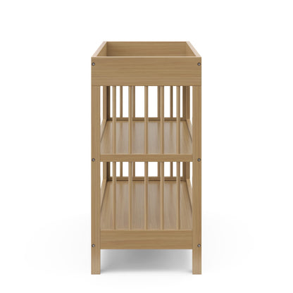 Graco Teddi Changing Table with Water-Resistant Changing Pad (Driftwood) - GREENGUARD Gold Certified, Includes Bonus Water-Resistant Changing Pad with Safety Strap, 2 Shelves, Easy-to-Match