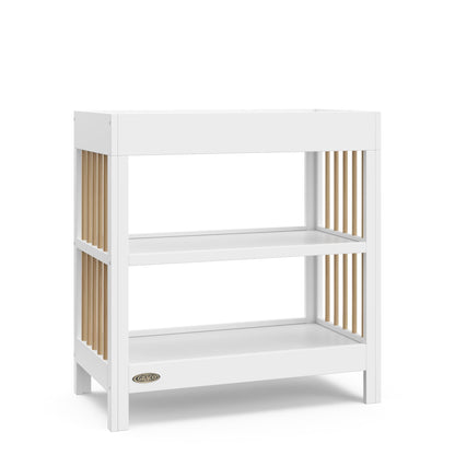 Graco Teddi Changing Table with Water-Resistant Changing Pad (Driftwood) - GREENGUARD Gold Certified, Includes Bonus Water-Resistant Changing Pad with Safety Strap, 2 Shelves, Easy-to-Match
