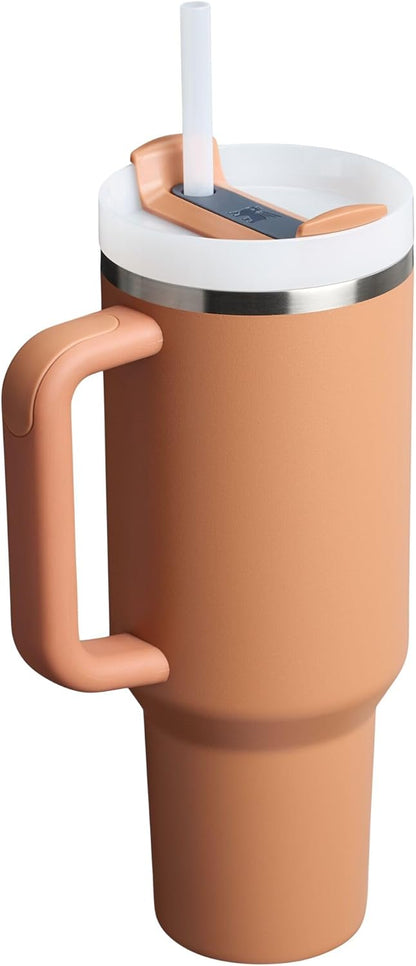 Vaso Stanley Quencher H2.0 con asa y pajita de 40 oz | Tapa Flowstate de 3 posiciones | Compatible con portavasos para viajes | Vaso térmico de acero inoxidable | Sin BPA | Arándano