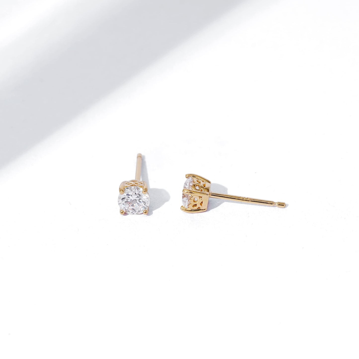 Amazon Essentials Yellow Gold Plated, Platinum or Rose Gold Plated Sterling Silver Infinite Elements Cubic Zirconia Stud Earrings | White, Blue, Green, or Pink Cubic Zirconia