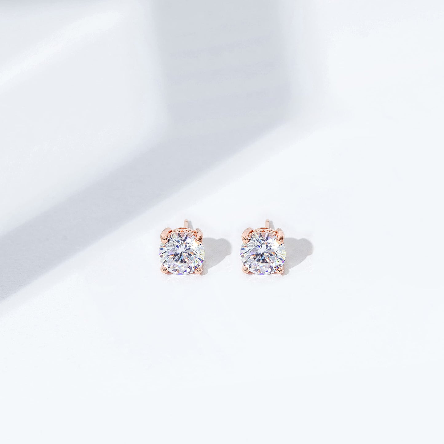 Amazon Essentials Yellow Gold Plated, Platinum or Rose Gold Plated Sterling Silver Infinite Elements Cubic Zirconia Stud Earrings | White, Blue, Green, or Pink Cubic Zirconia
