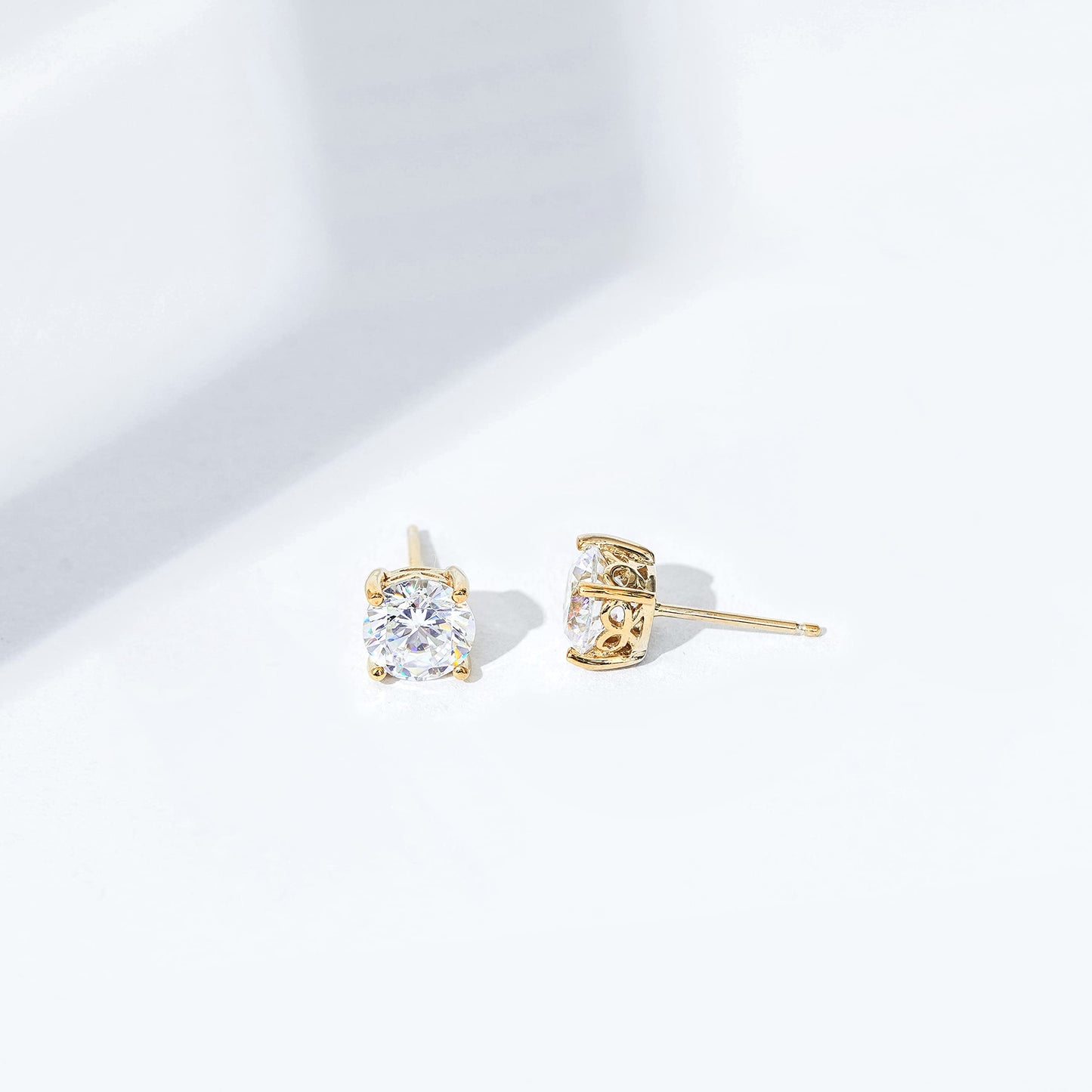 Amazon Essentials Yellow Gold Plated, Platinum or Rose Gold Plated Sterling Silver Infinite Elements Cubic Zirconia Stud Earrings | White, Blue, Green, or Pink Cubic Zirconia