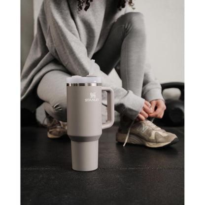 Stanley Quencher H2.0 Tumbler with Handle and Straw 40 oz | Flowstate 3-Position Lid | Cup Holder Compatible for Travel | Insulated Stainless Steel Cup | BPA-Free | Almond Rose