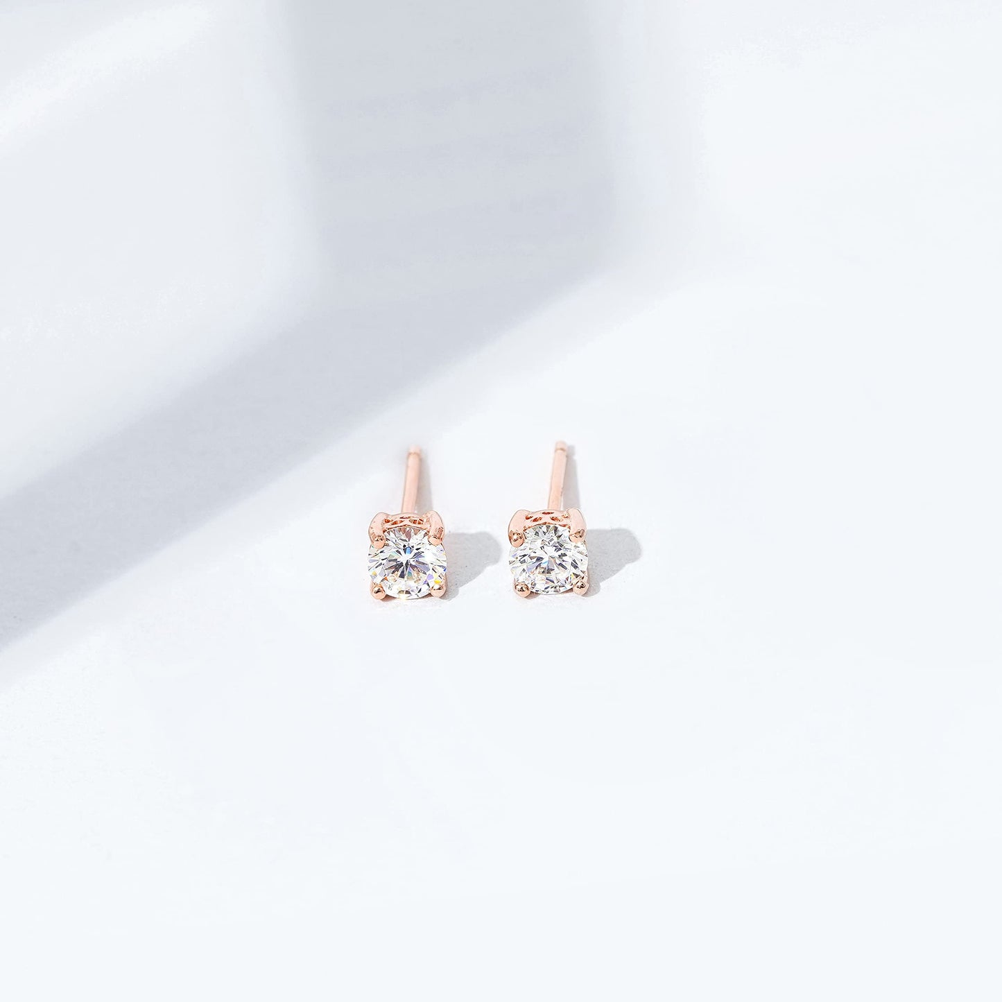Amazon Essentials Yellow Gold Plated, Platinum or Rose Gold Plated Sterling Silver Infinite Elements Cubic Zirconia Stud Earrings | White, Blue, Green, or Pink Cubic Zirconia