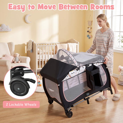 BABY JOY 4 in 1 Pack and Play with Canopy, Portable Baby Playard with Bassinet, Double-Layer Baby Crib, Wheels & Brake, Foldable Baby Girl Pink Bassinet from Newborn to Toddler