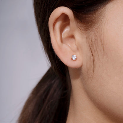 Amazon Essentials Yellow Gold Plated, Platinum or Rose Gold Plated Sterling Silver Infinite Elements Cubic Zirconia Stud Earrings | White, Blue, Green, or Pink Cubic Zirconia
