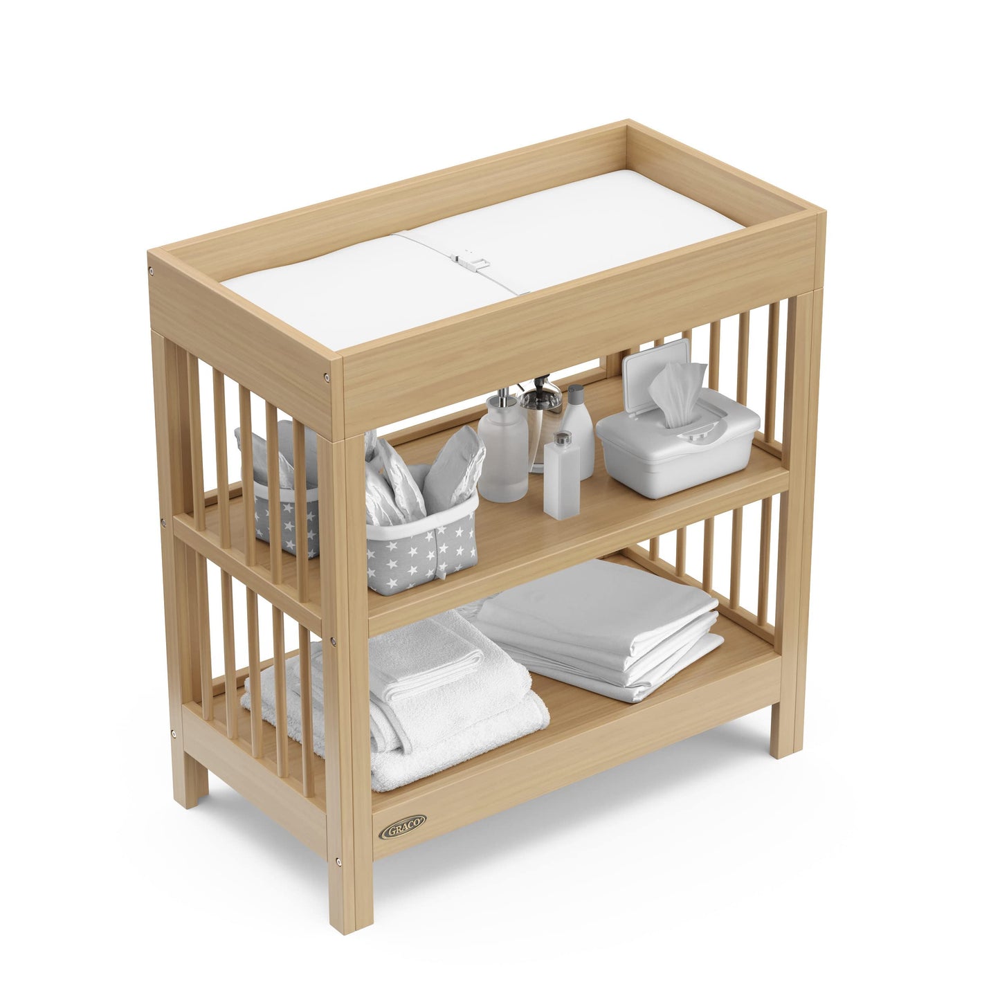 Graco Teddi Changing Table with Water-Resistant Changing Pad (Driftwood) - GREENGUARD Gold Certified, Includes Bonus Water-Resistant Changing Pad with Safety Strap, 2 Shelves, Easy-to-Match