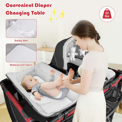 BABY JOY 5 in 1 Pink Pack and Play, Portable Baby Playard with Bassinet & Changing Table, Infant Pink Girl Bassinet Center w/Hangings & Music & Oxford Bag for Baby Toddlers (Rose, Dot Circle)