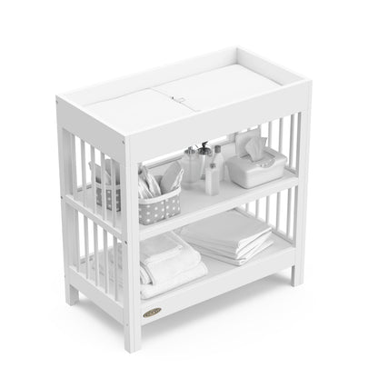 Graco Teddi Changing Table with Water-Resistant Changing Pad (Driftwood) - GREENGUARD Gold Certified, Includes Bonus Water-Resistant Changing Pad with Safety Strap, 2 Shelves, Easy-to-Match
