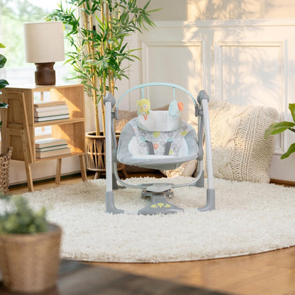 Ingenuity ConvertMe 2-in-1 Kompakte tragbare automatische Babyschaukel & Babysitz, batteriebetriebene Vibrationen, Naturgeräusche, 0-9 Monate 2,7-9 kg (Raylan)