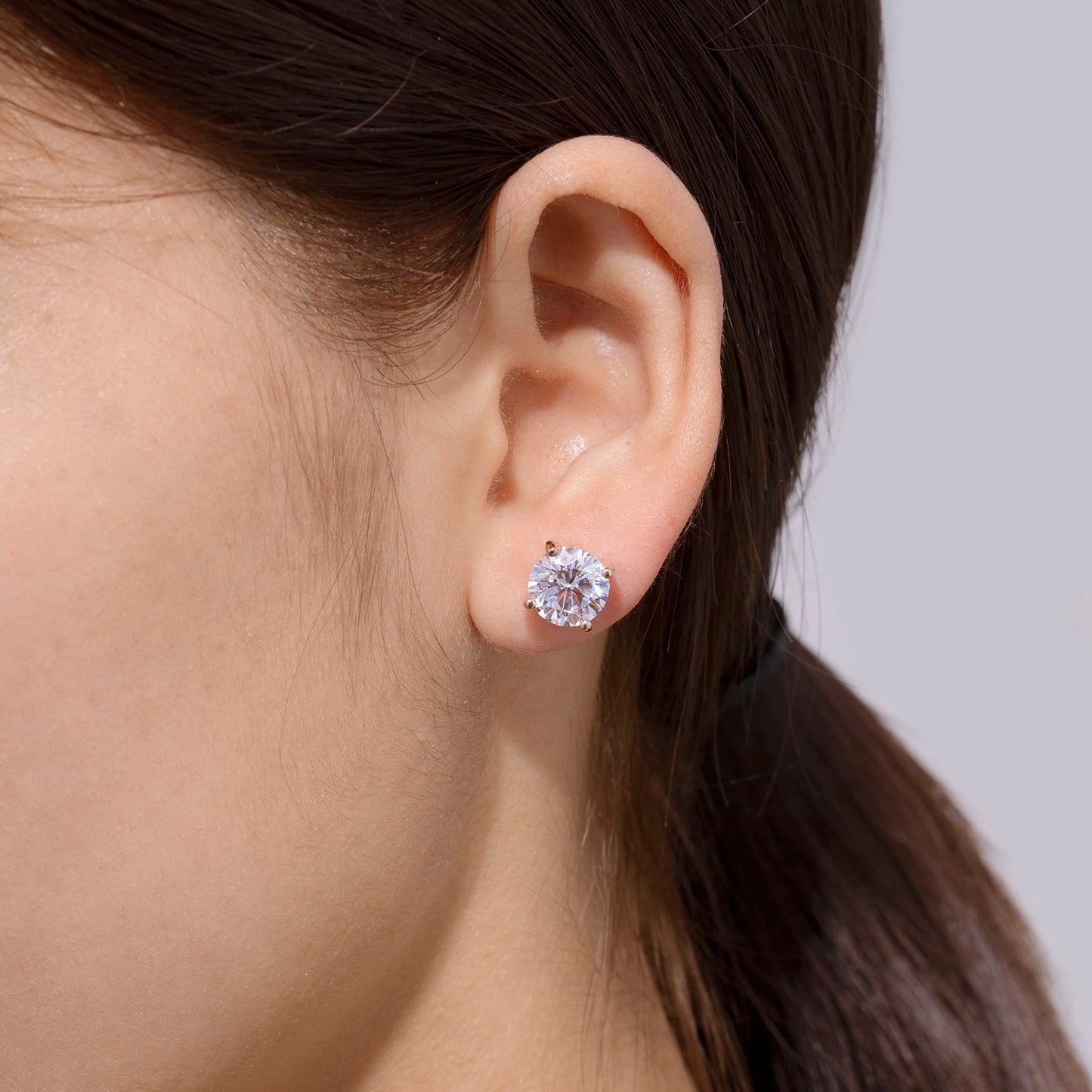 Amazon Essentials Yellow Gold Plated, Platinum or Rose Gold Plated Sterling Silver Infinite Elements Cubic Zirconia Stud Earrings | White, Blue, Green, or Pink Cubic Zirconia