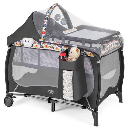 BABY JOY 4 in 1 Pack and Play with Canopy, Portable Baby Playard with Bassinet, Double-Layer Baby Crib, Wheels & Brake, Foldable Baby Girl Pink Bassinet from Newborn to Toddler
