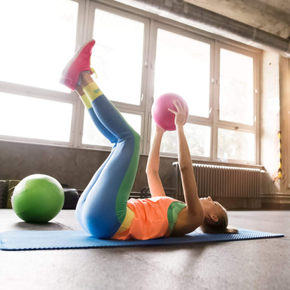 URBNFit Kleiner Gymnastikball - 23 cm Mini Pilates Ball mit Fitness Guide für Yoga, Barre, Physiotherapie, Stretching & Core Stability Workout-Pink