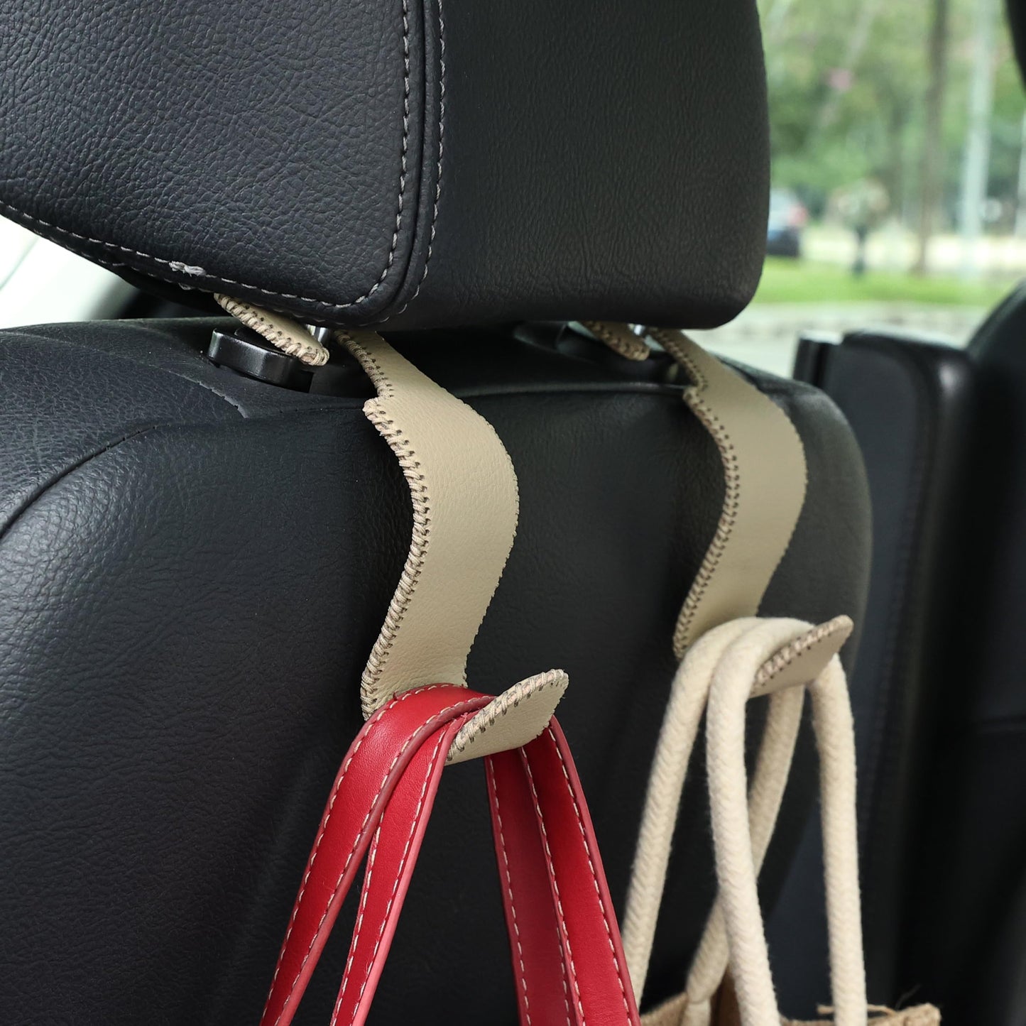 Amooca 4-Pack Car Headrest Hooks Vehicle Storage Organizer for Purses Handbags Groceries Backpack Coats –Holds 55lbs 360° Rotating Black
