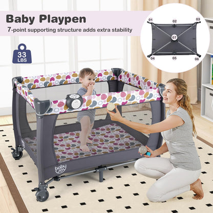 BABY JOY 5 in 1 Pink Pack and Play, Portable Baby Playard with Bassinet & Changing Table, Infant Pink Girl Bassinet Center w/Hangings & Music & Oxford Bag for Baby Toddlers (Rose, Dot Circle)